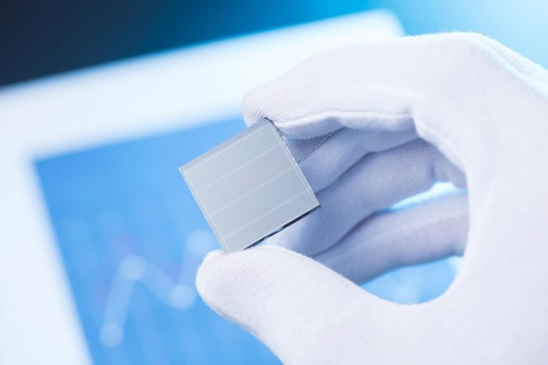 Scientist Holding Advanced New Solar Cell