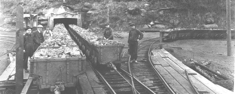 Coal Mine Workers With Ore Carts